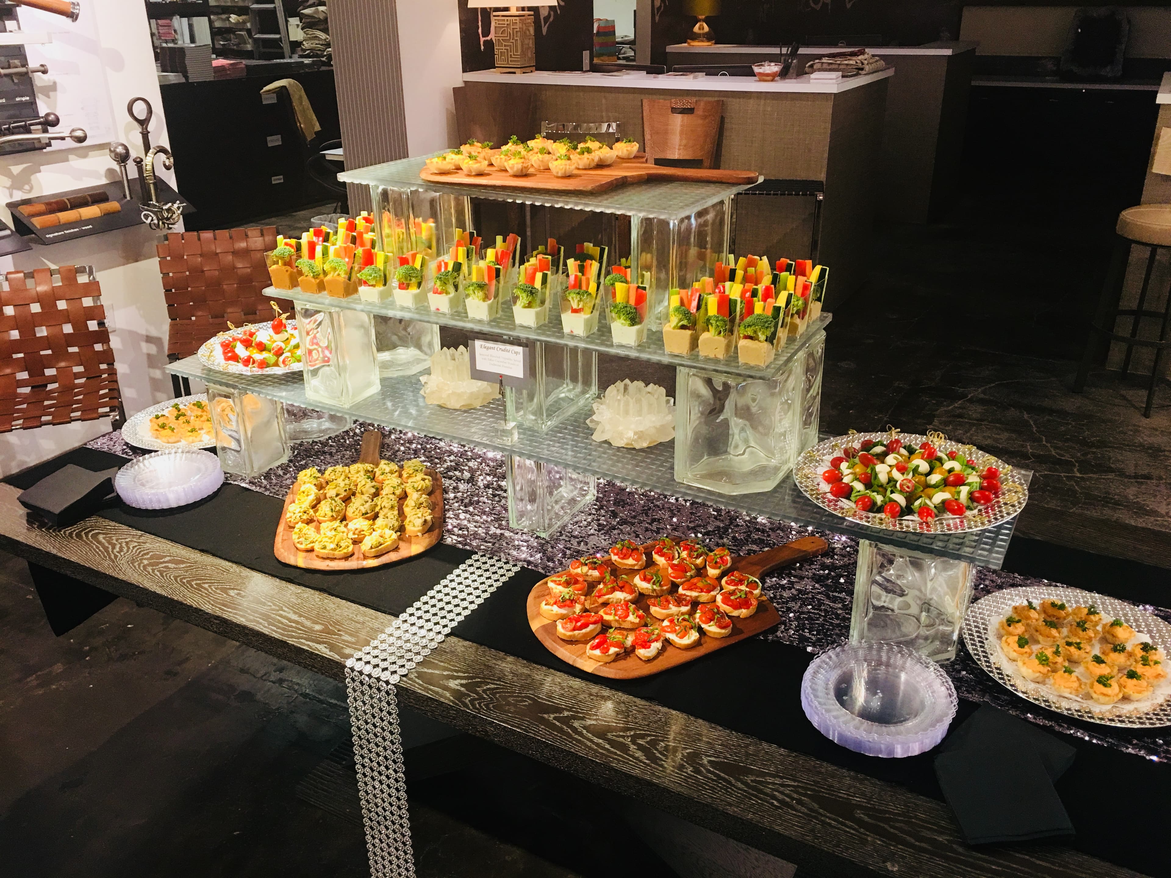 Detailed grazing-table setup with polished service ware