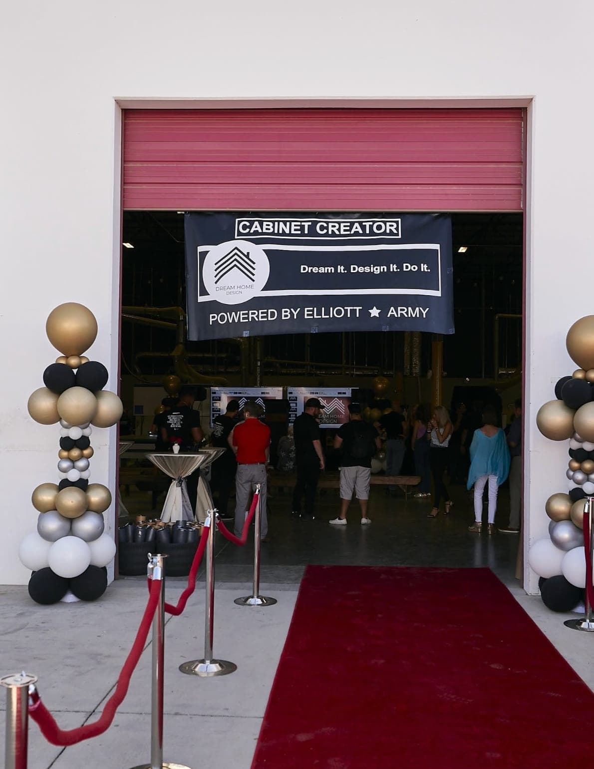 Red-carpet entrance with balloon columns at a corporate launch