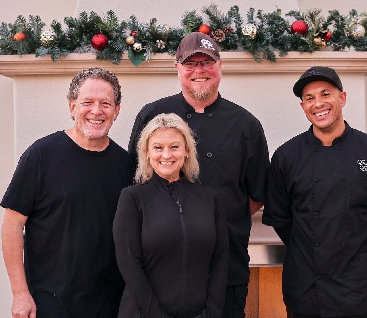 The Emily's Events service team and chefs in black uniforms
